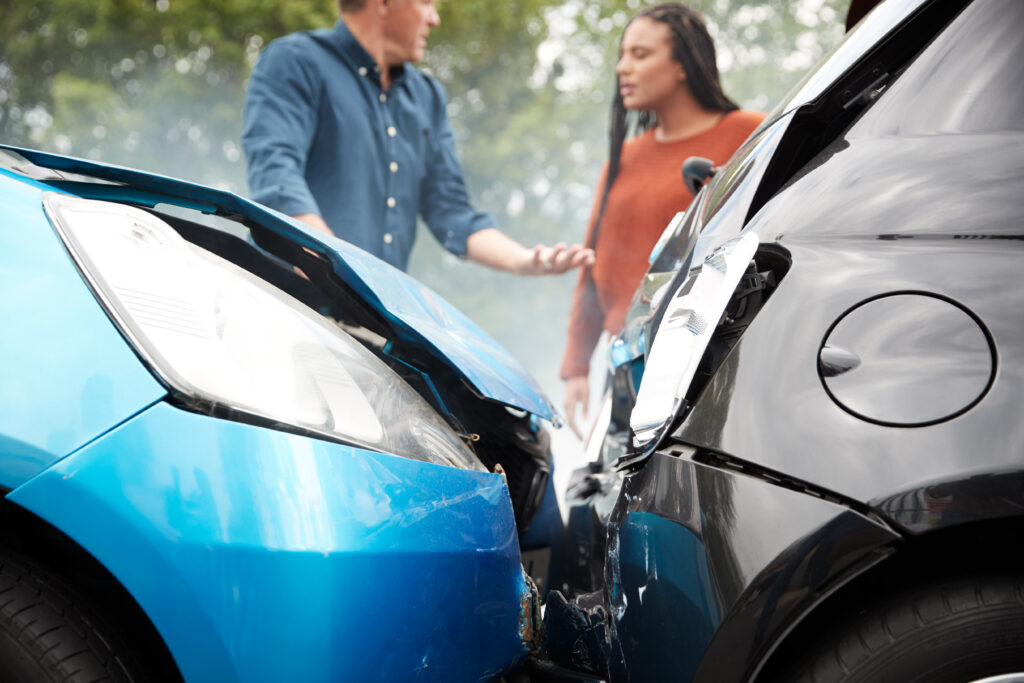 Two Angry Drivers Arguing Over Responsibility For Car Accident