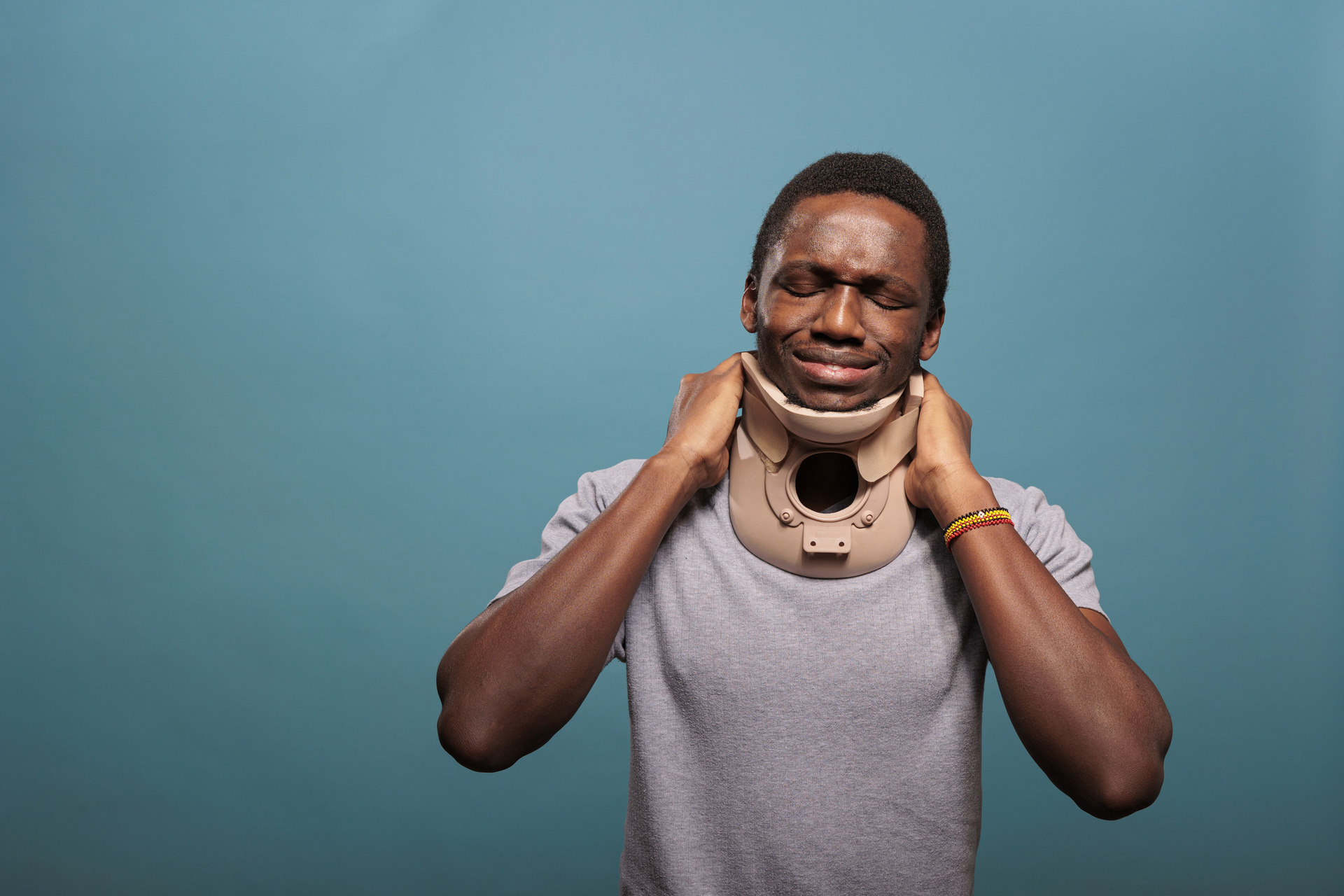 guy wearing cervical collar